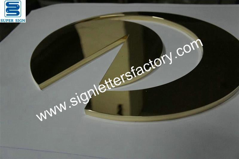 fabricated polished mirror brass logo